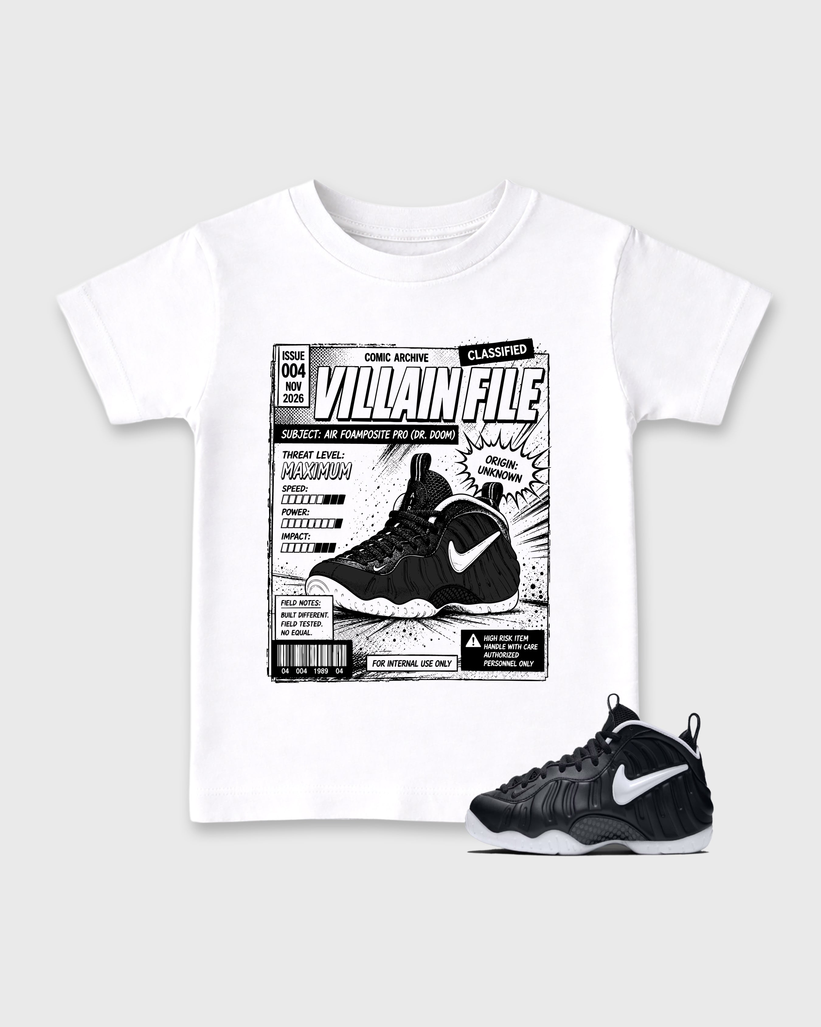 Villain File Baby & Kids Graphic T-Shirt featuring original artwork designed to match the Air Foamposite Pro Dr.Doom. White 1 Kids Graphic Tee.