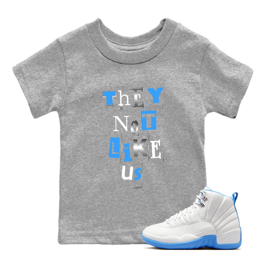 Vintage They Not Like Us baby and kids t-shirt crafted for little sneakerheads to shine with the Air Jordan 12 White and University Blue sneakers, displayed in Heather Grey 1.
