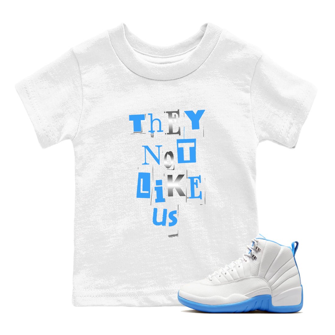 Vintage They Not Like Us baby and kids t-shirt crafted for little sneakerheads to shine with the Air Jordan 12 White and University Blue sneakers, displayed in White 1.