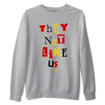 Vintage They Not Like Us sneaker match t-shirt styled to complete your fit with the Air Jordan 14 Challenge Red sneakers, graphic shirts in Heather Grey 2.