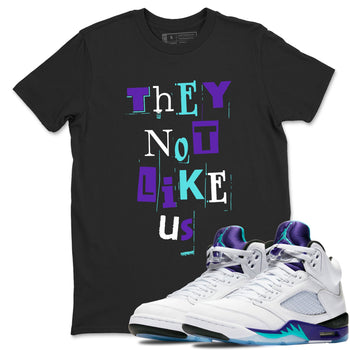 Vintage They Not Like Us sneaker match t-shirt styled to complete your fit with the Air Jordan 5 Grape sneakers, shown in Black 1.