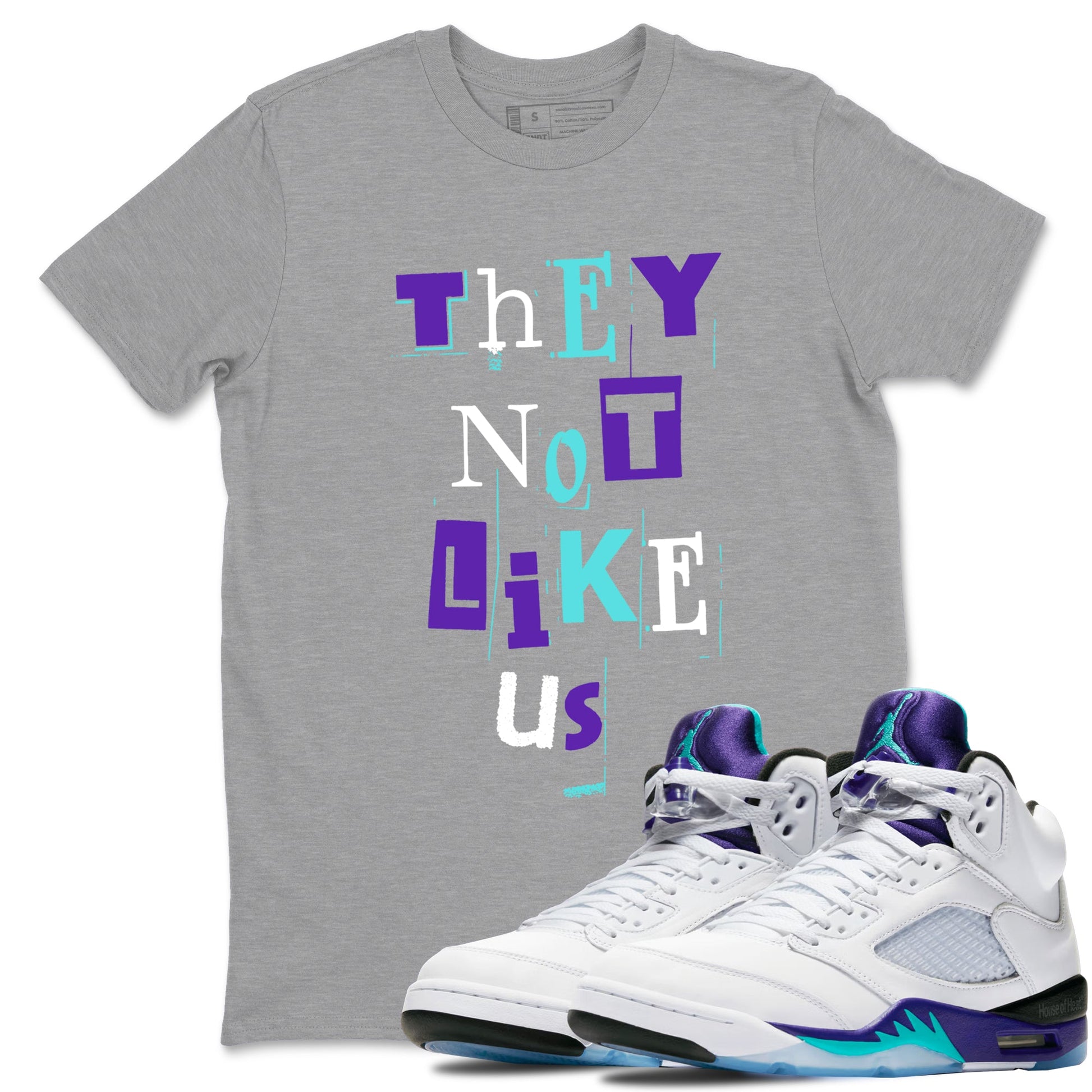 Vintage They Not Like Us sneaker match t-shirt styled to complete your fit with the Air Jordan 5 Grape sneakers, shown in Heather Grey 1.