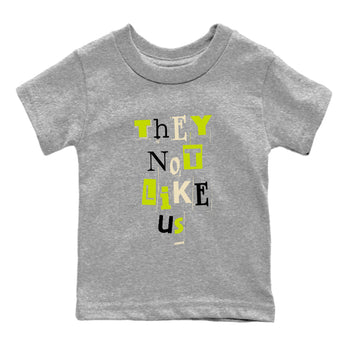 Vintage They Not Like Us baby and kids t-shirt crafted for little sneakerheads to shine with the Jordan Jumpman Jack Travis Scott Bright Cactus sneakers, displayed in Heather Grey 2.