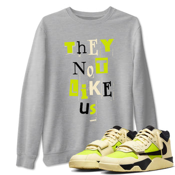 Vintage They Not Like Us sneaker match t-shirt styled to complete your fit with the Jordan Jumpman Jack Travis Scott Bright Cactus sneakers, shown in Heather Grey 1.