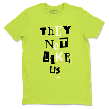 Vintage They Not Like Us sneaker match t-shirt styled to complete your fit with the Jordan Jumpman Jack Travis Scott Bright Cactus sneakers, shown in Safety Green 2.