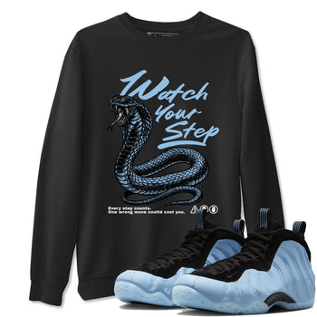 Watch Your Step sneaker match t-shirt styled to complete your fit with the Air Foamposite One Psychic Blue sneakers, shown in Black 1.