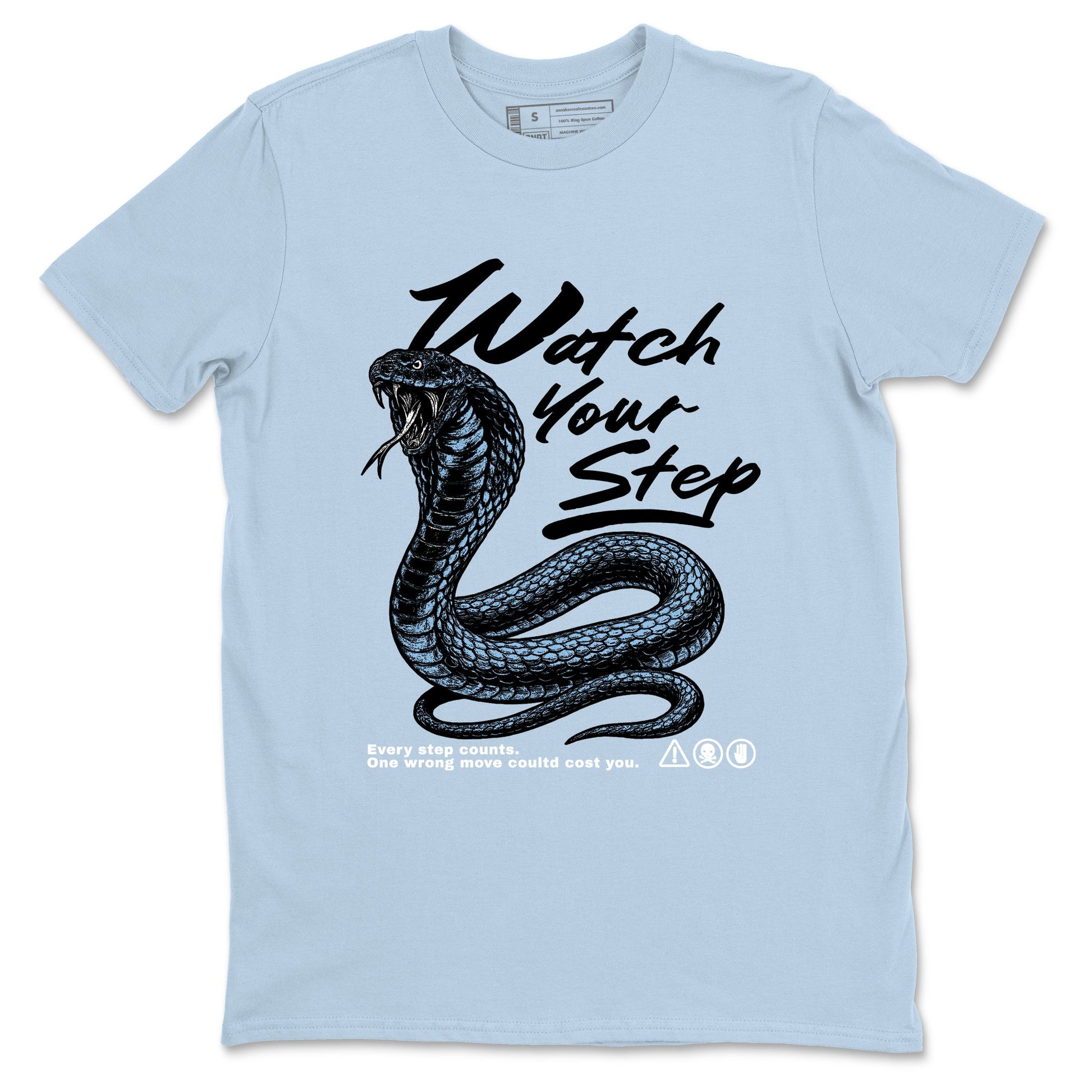 Watch Your Step sneaker match t-shirt styled to complete your fit with the Air Foamposite One Psychic Blue sneakers, shown in Light Blue 2.