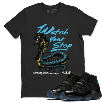 Sneaker Threads – Sneaker Tees To Match Air Jordan 11 Retro Gamma – Watch Your Step Graphic Tee Black 1. Perfect for Jordan releases 2025 colorways.