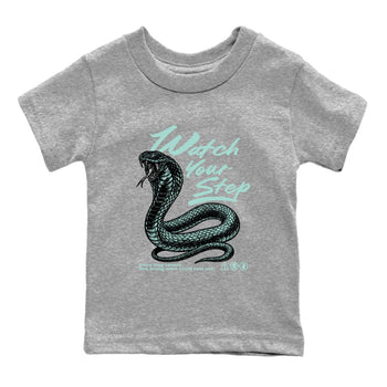 Watch Your Step baby and kids t-shirt crafted for little sneakerheads to shine with the Air Jordan 11 Igloo sneakers, displayed in Heather Grey 2.