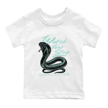 Watch Your Step baby and kids t-shirt crafted for little sneakerheads to shine with the Air Jordan 11 Igloo sneakers, displayed in White 2.
