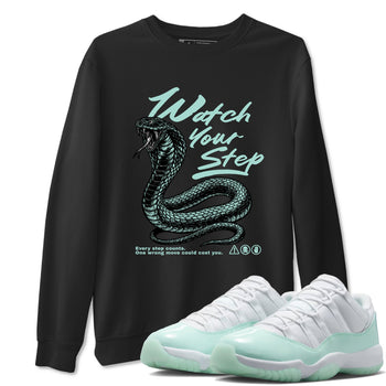 Watch Your Step sneaker match t-shirt styled to complete your fit with the Air Jordan 11 Igloo sneakers, shown in Black 1.