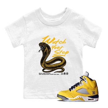 Watch Your Step baby and kids t-shirt crafted for little sneakerheads to with the Air Jordan 5 Tokyo sneakers, displayed in White 1.