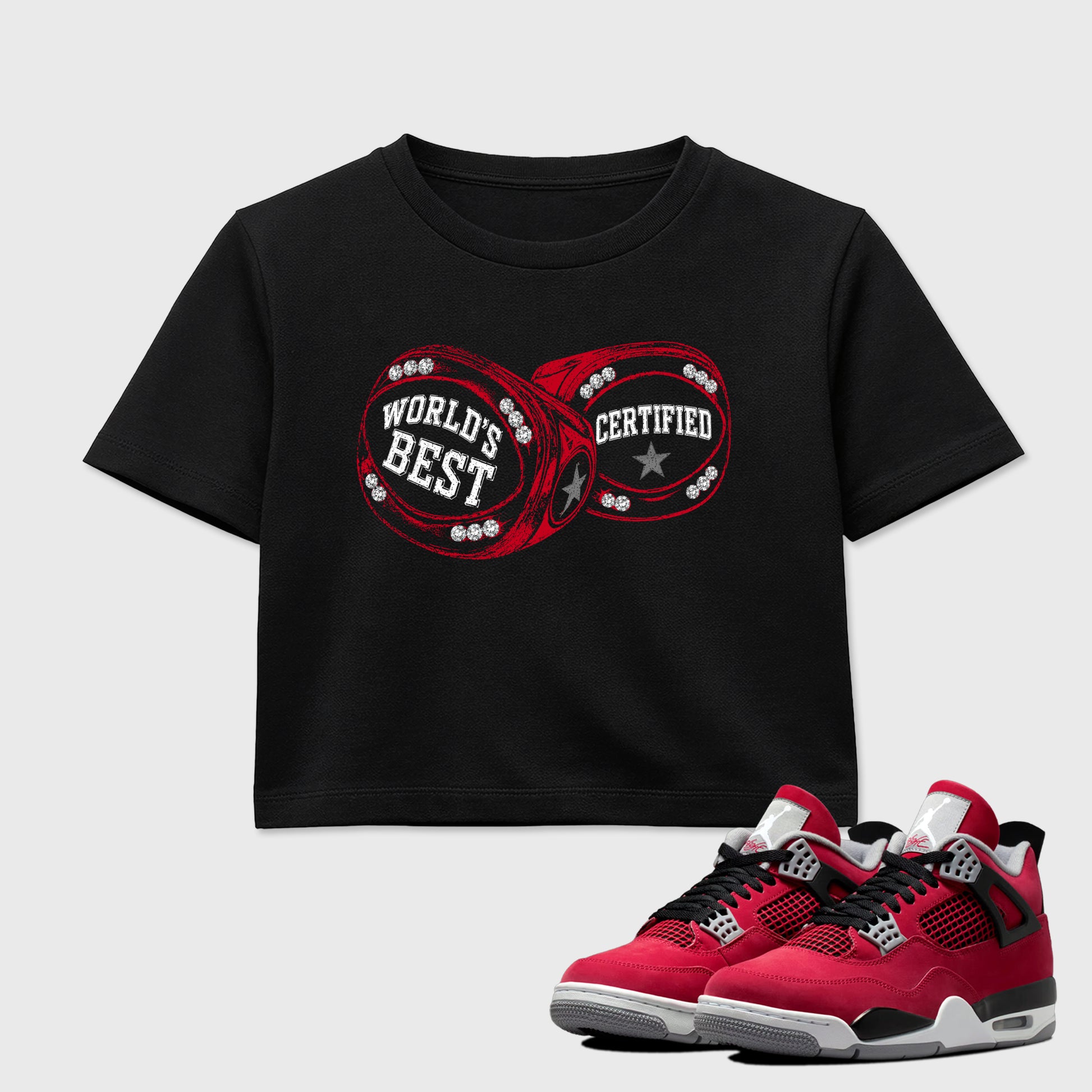 World's Best Certified women’s crop tee designed to match the Air Jordan 12 Retro Bloodline, featuring coordinated Black 1 options for a perfect streetwear vibe.