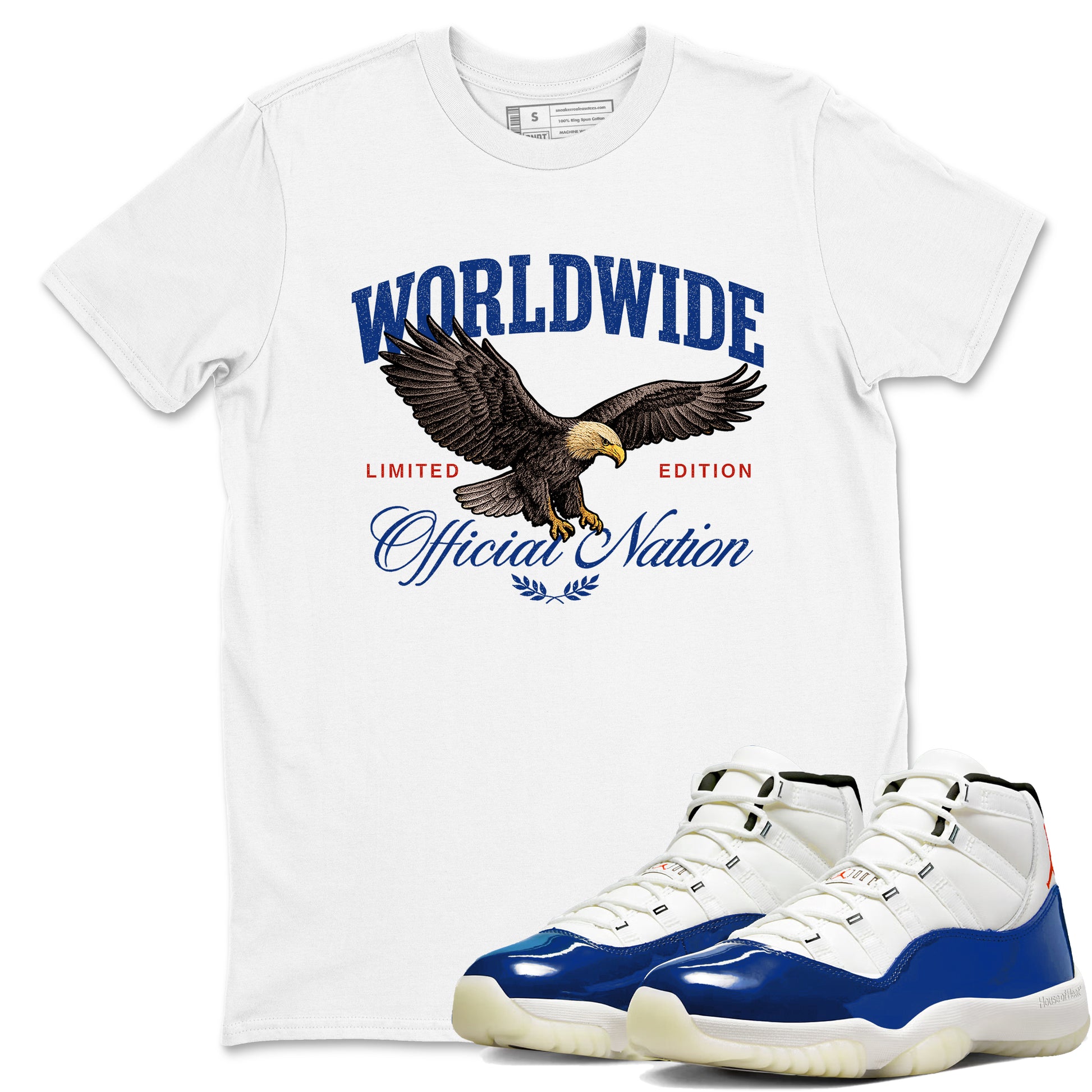 White t-shirt with eagle graphic and text, paired with blue and white sneakers.
