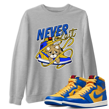 1s Game Royal Varsity Maize shirt to match jordans Never Quit sneaker tees Air Jordan 1 Game Royal Varsity Maize SNRT Sneaker Release Tees Crew Neck T-ShirtUnisex Heather Grey 1 T-Shirt