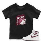 1s Metallic Burgundy shirt to match jordans Vintage Toy Packaging sneaker tees AJ1 Metallic Burgundy SNRT Sneaker Release Tees Baby Toddler Black 1 T-Shirt